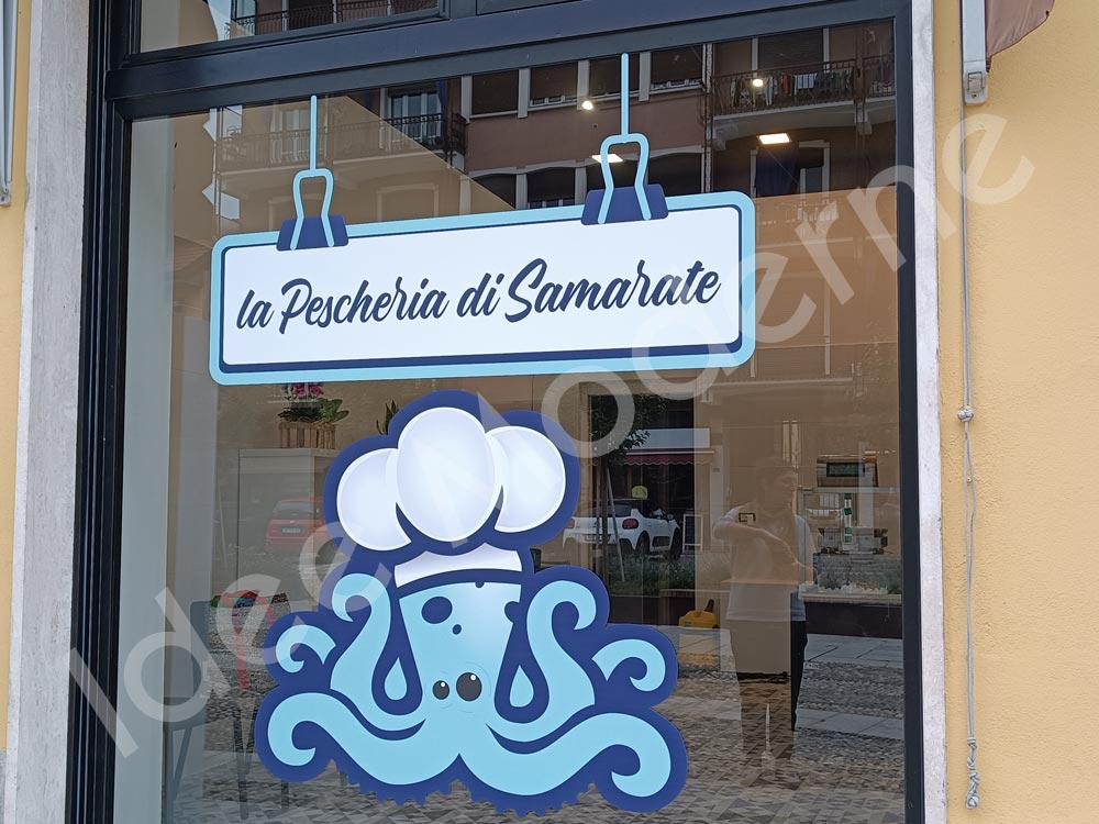 Decorazione vetrine negozio Gallarate con vetrofanie su misura