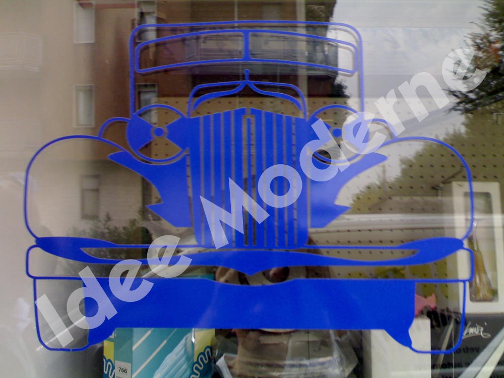 Scritte adesive personalizzate per negozio Saronno