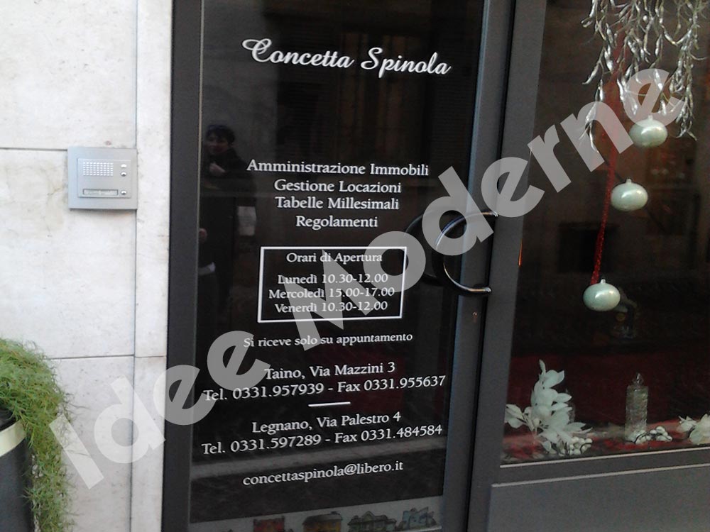 Scritte adesive personalizzate per negozio Saronno