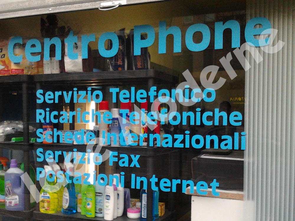 Scritte adesive personalizzate per negozio Saronno