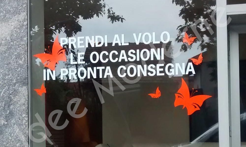 Scritte adesive personalizzate per negozio Rho